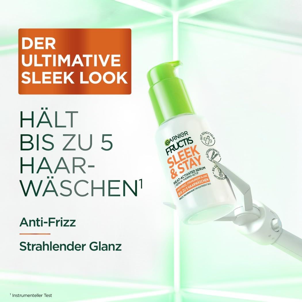 Garnier Fructis Sleek & Stay Serum. Witte fles met groene pomp. Tekst: Blijft tot 5 wasbeurten, anti-frizz.