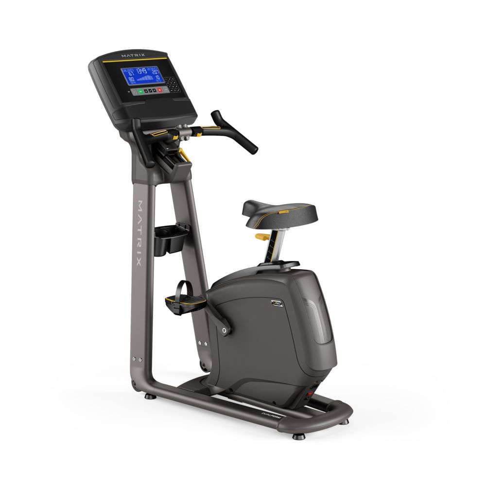 Vision Fitness U50. Vélo d'appartement gris avec console, porte-gobelet et pédales. Le logo Matrix est visible.