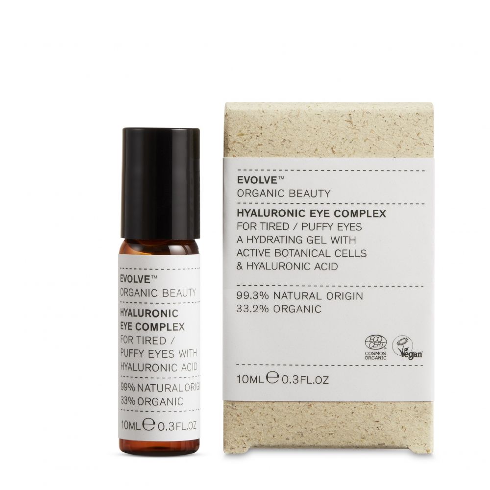 Flacon en verre brun et boîte en carton. Inscription : Evolve, Hyaluronic Eye Complex, pour yeux fatigués/gonflés. Label Vegan.