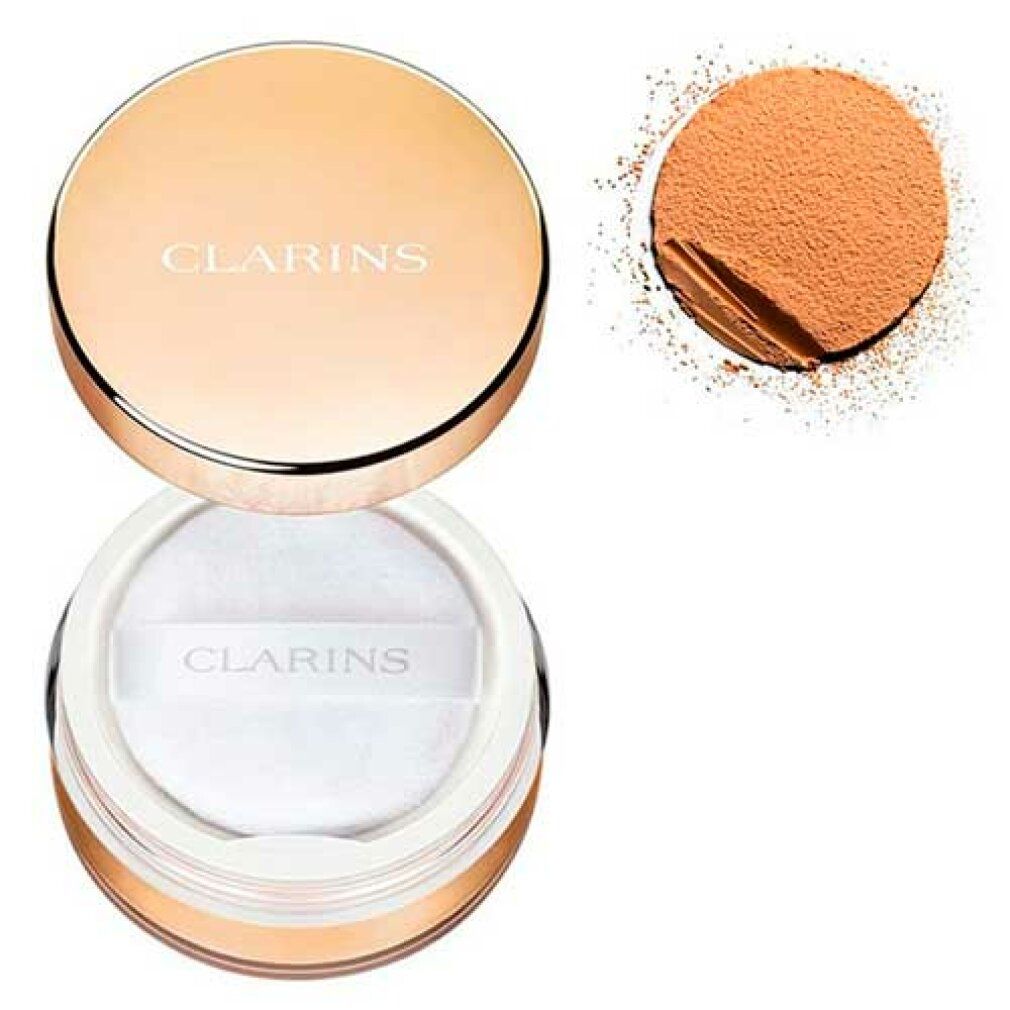 Clarins poeder in een gouden pot met een witte poederdons.