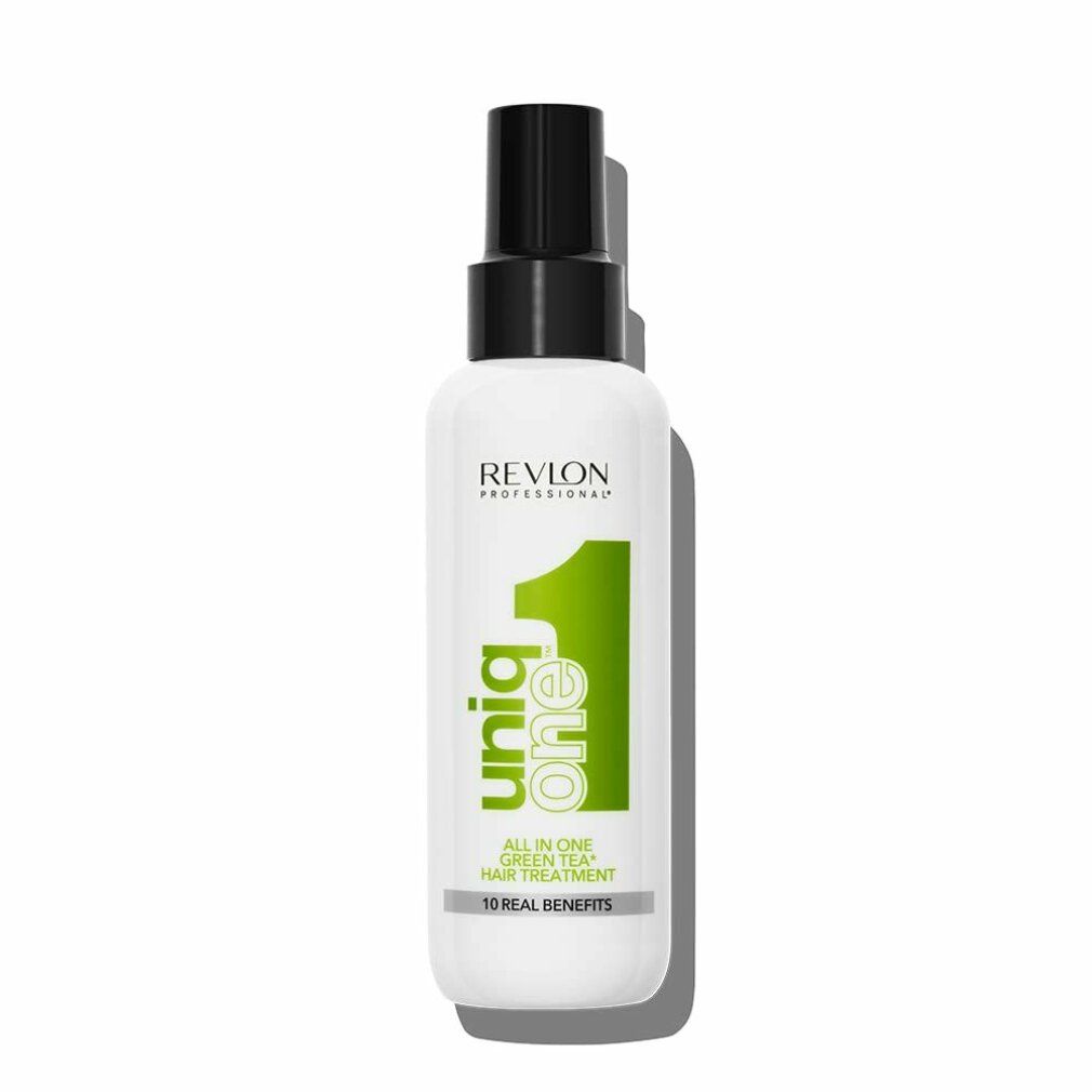 Spray capillaire blanc avec tête noire. Inscription : Uniq One, Revlon Professional, All in One Green Tea Hair Treatment, 10 Real Benefits.