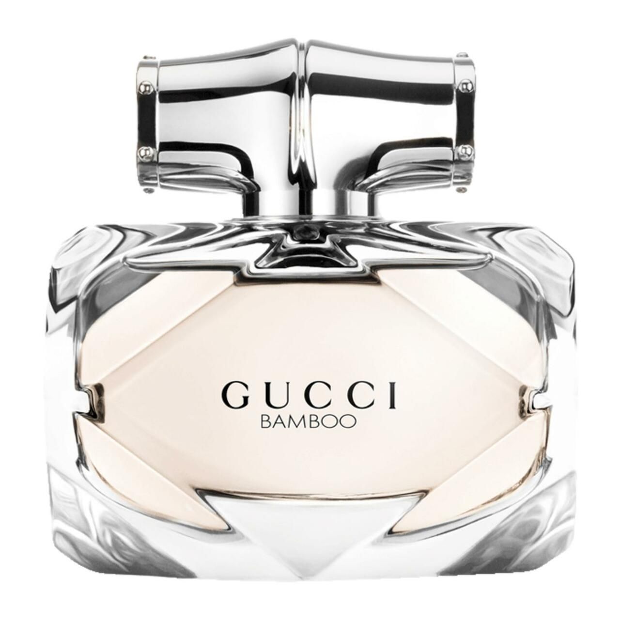 Gucci Bamboo Eau de Toilette Spray. Flacon en verre avec bouchon argenté. Flacon de forme carrée avec liquide brun clair. Logo sur le devant.