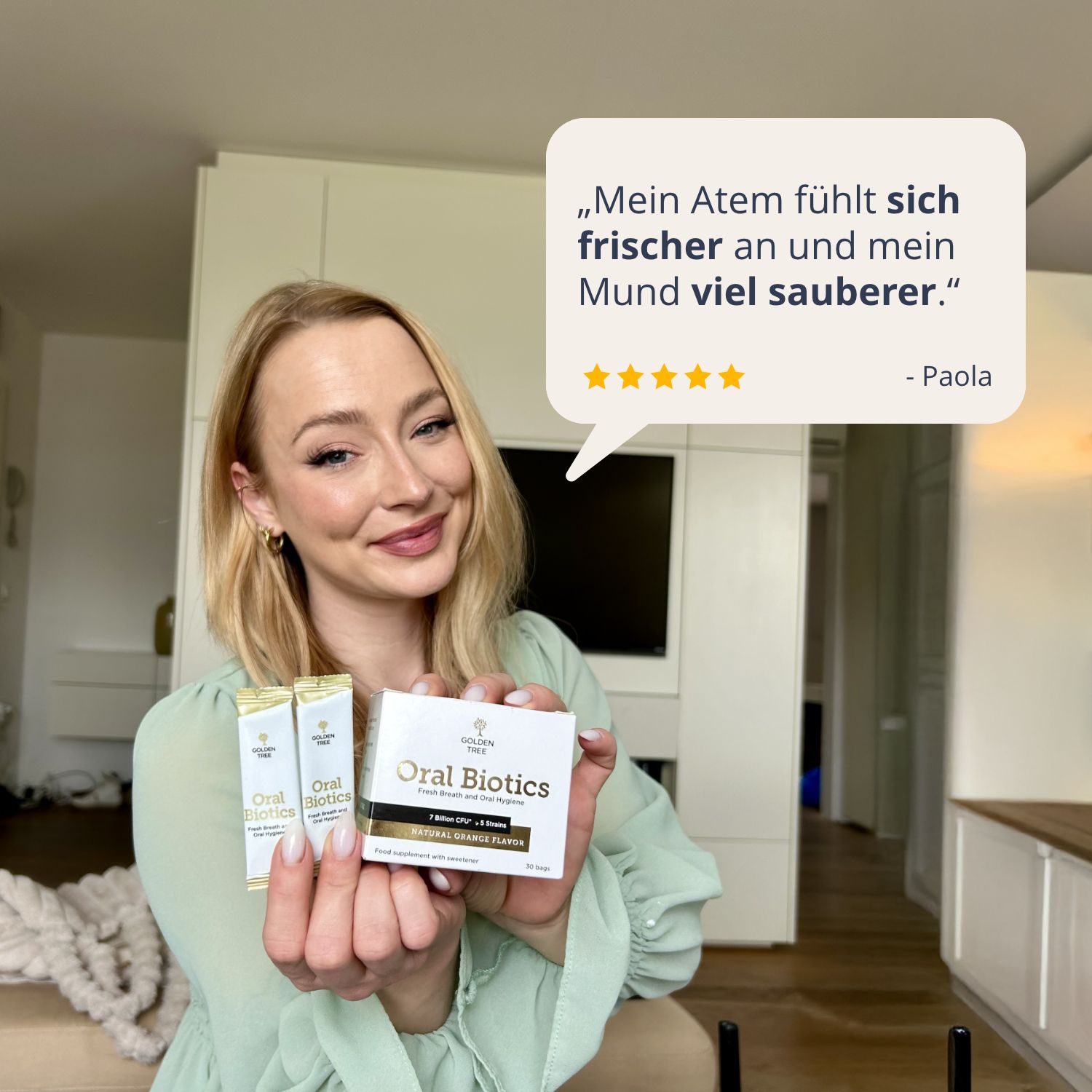 Femme avec Golden Tree Oral Biotics. Citation : 'Mon haleine est plus fraîche'.