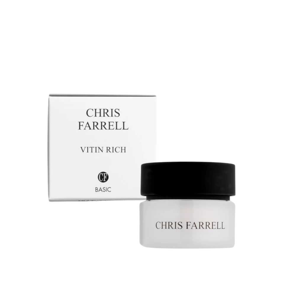 Pot de crème avec couvercle noir et boîte. Le pot porte la mention "CHRIS FARRELL". La boîte porte la mention "CHRIS FARRELL VITIN RICH".