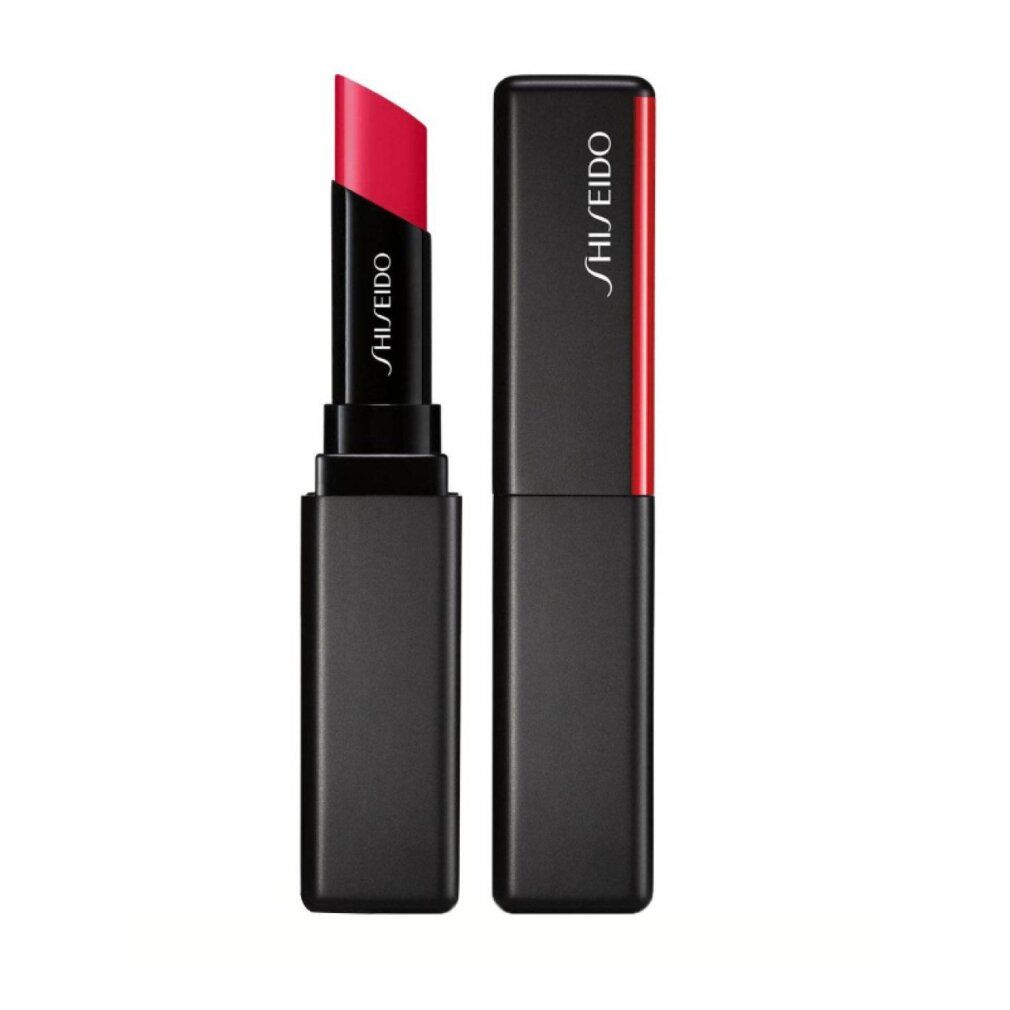 Rode lippenbalsem met zwarte behuizing. Behuizing met rode streep en Shiseido-logo. Open en gesloten.