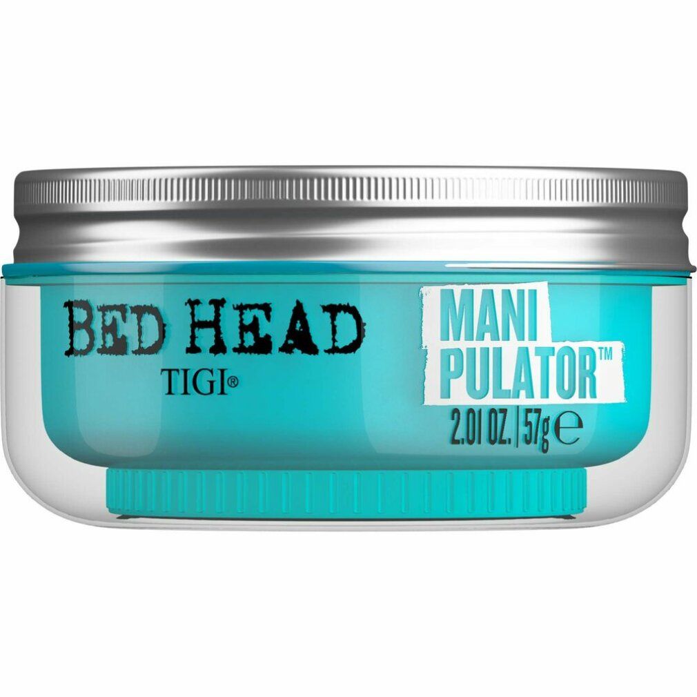 Tigi Bed Head Manipulator Matte Paste. Pot avec contenu bleu, couvercle argenté. Texte: Manipulator, 2.01 oz. / 57ge.