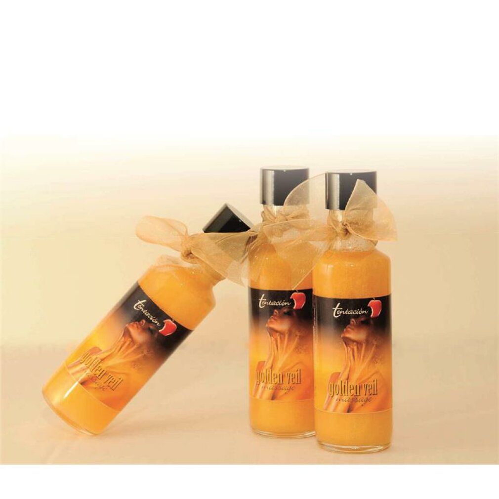 Huile de massage dorée dans une bouteille en verre avec bouchon noir et nœud. Étiquette avec femme et pomme.