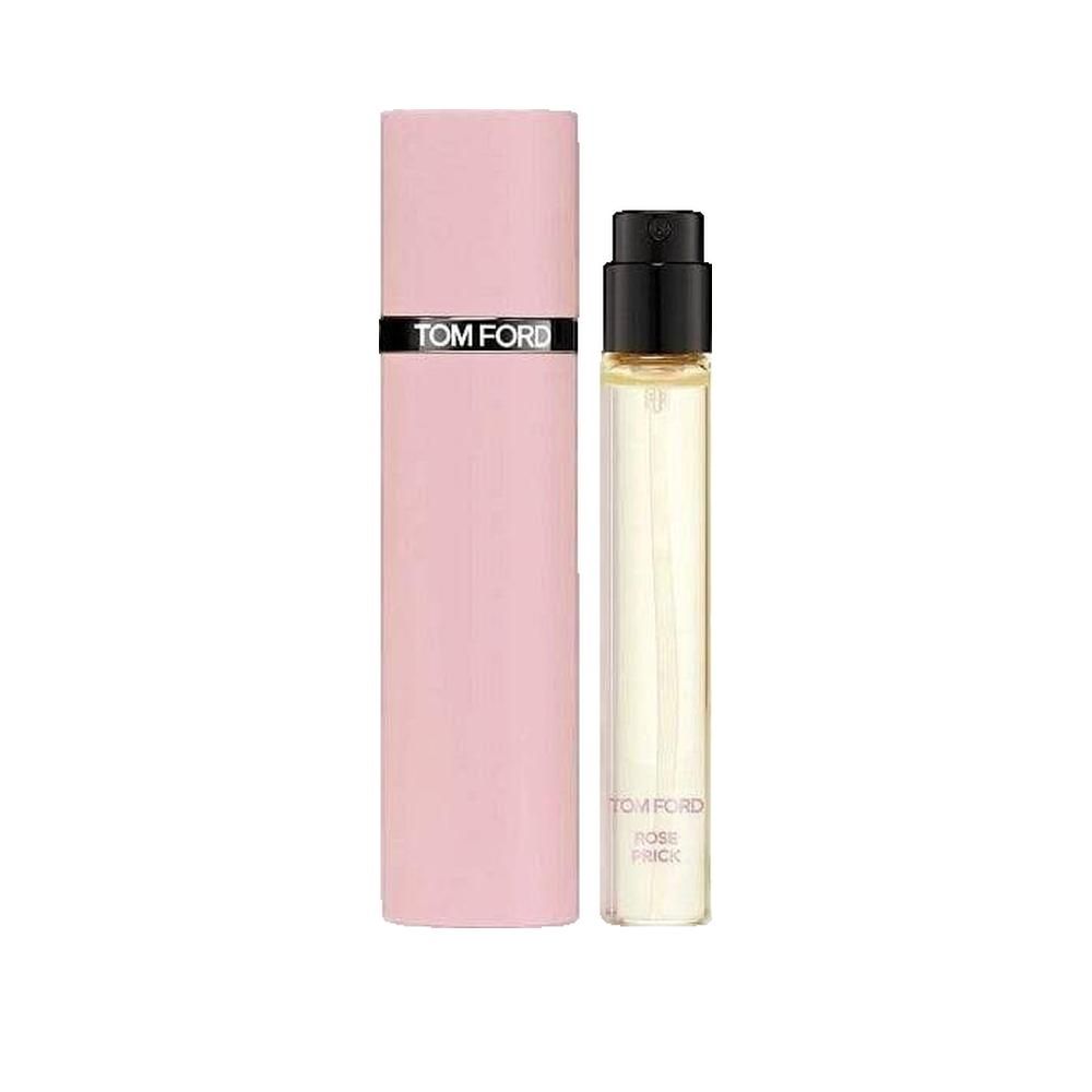 Parfum Rose Prick. Étui rose avec texte noir TOM FORD. Flacon transparent avec vaporisateur noir.