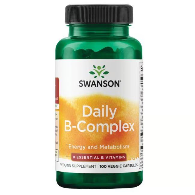 Flacon vert avec bouchon noir. Étiquette avec "SWANSON", "Daily B-Complex" et "100 Veggie Capsules".