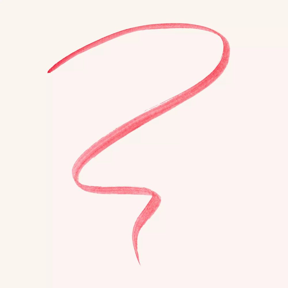 Trait d'eyeliner rouge sur fond clair.