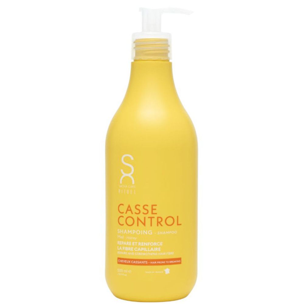 Gele shampoo fles met witte pomp. Opschrift: CASSE CONTROL, shampoo. Voor breekbaar haar.