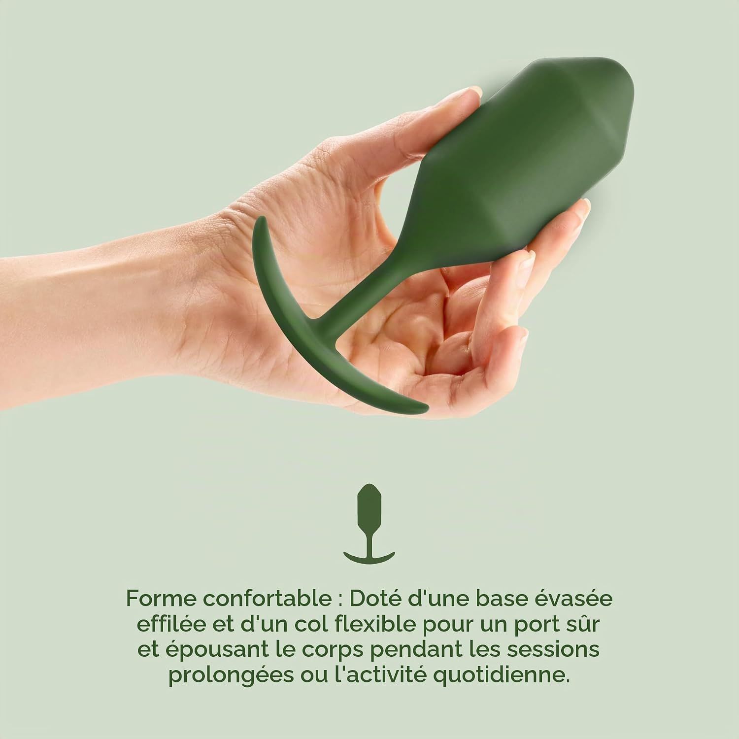 Plug vert avec poignée en T, tenu dans une main.