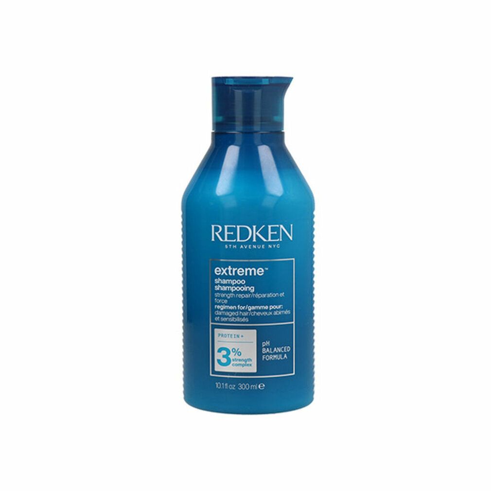 Blauwe shampoo fles. Opschrift: REDKEN, extreme shampoo, 3% strength complex, pH balanced formula. 300ml.