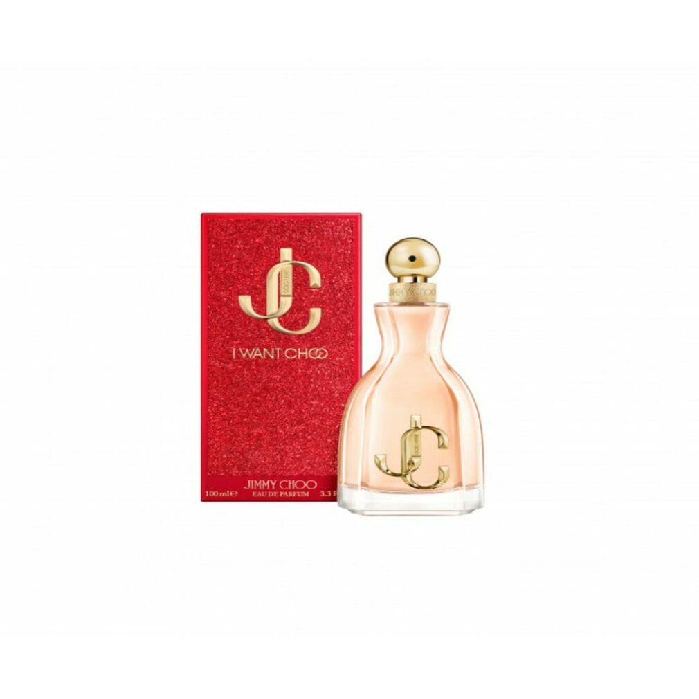 Flacon de parfum et boîte rouge. Logo doré et inscription "I WANT CHOO". Flacon avec liquide rose.