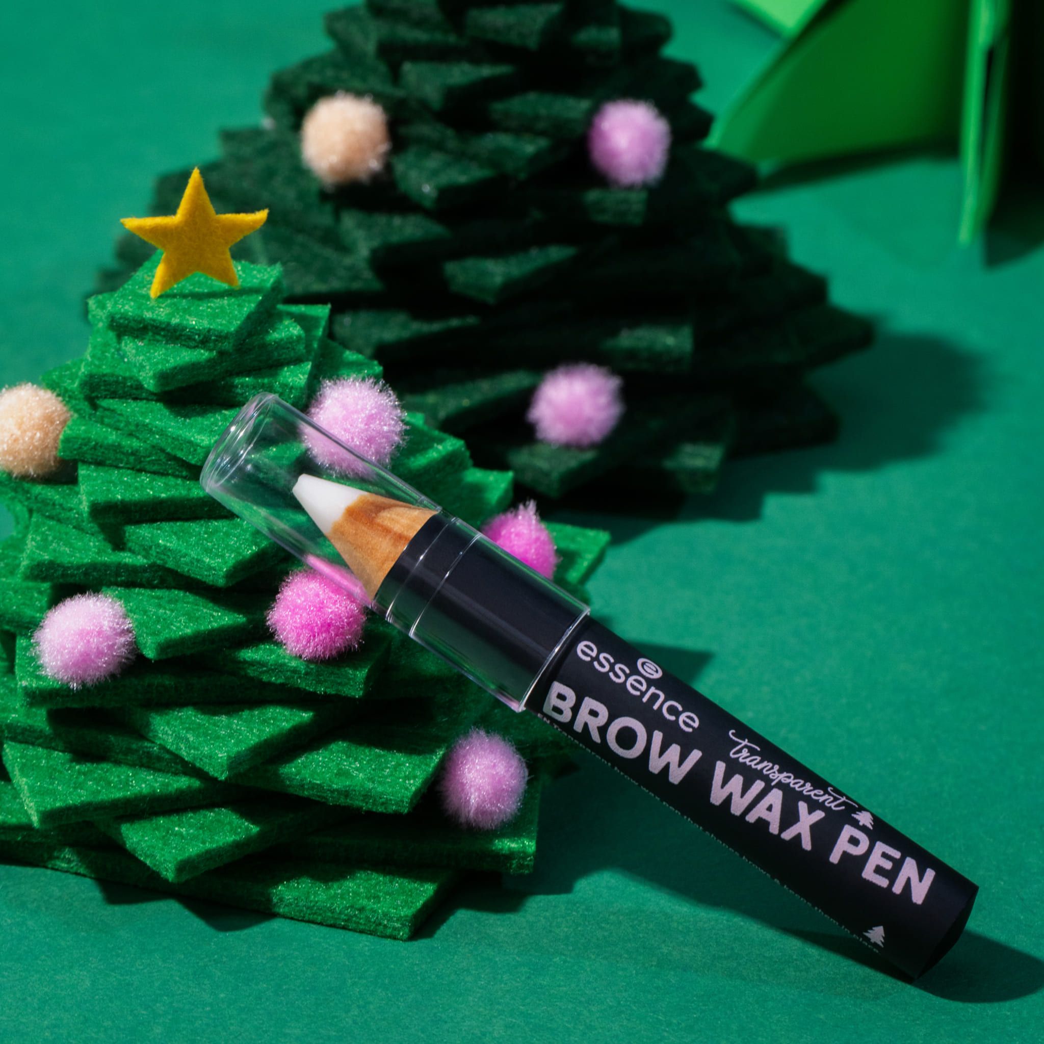 Essence Brow Wax Pen. Zwarte pen met transparante dop. Gouden vulling.