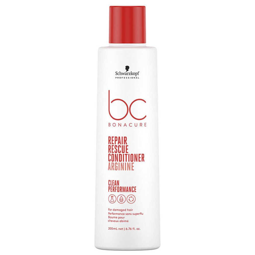 Witte fles met rode dop. Opschrift: Schwarzkopf Professional, bc Bonacure, Repair Rescue Conditioner Arginine. Voor beschadigd haar.