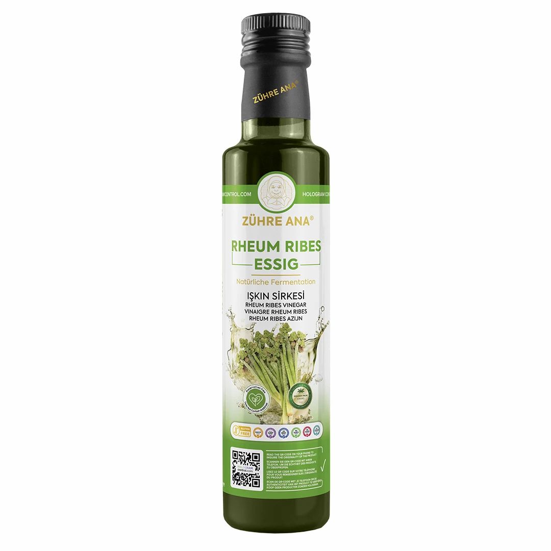 Donkergroene glazen fles Zühre Ana Rheum Ribes Essig met zwarte draaidop. Etiket met illustratie van rabarberwortel.