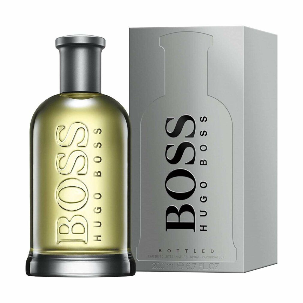 Parfumfles en verpakking. Fles met zilveren dop, opschrift BOSS. Verpakking met BOSS-logo en productnaam.