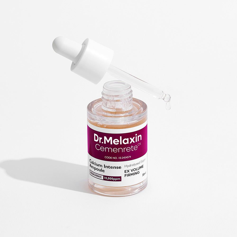 Ampoule Dr. Melaxin Cemenrete avec pipette, du liquide dégouline.