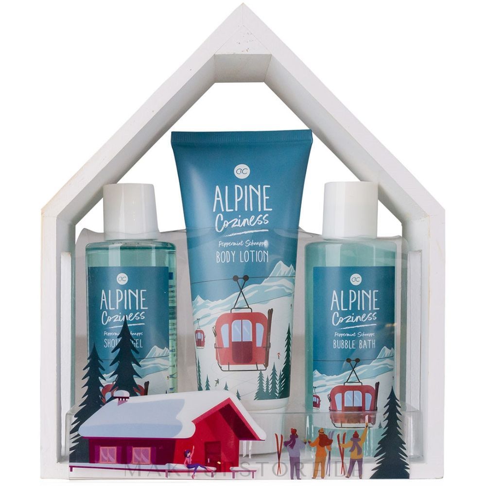 Badset in witte huisvormige lijst. Bevat douchegel, schuimbad en bodylotion. Illustratie: kabelbaan, bergen, huis.