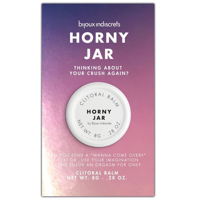 Emballage du baume pour clitoris Bijoux Indiscrets Horny Jar. Dégradé violet, texte sur le devant.