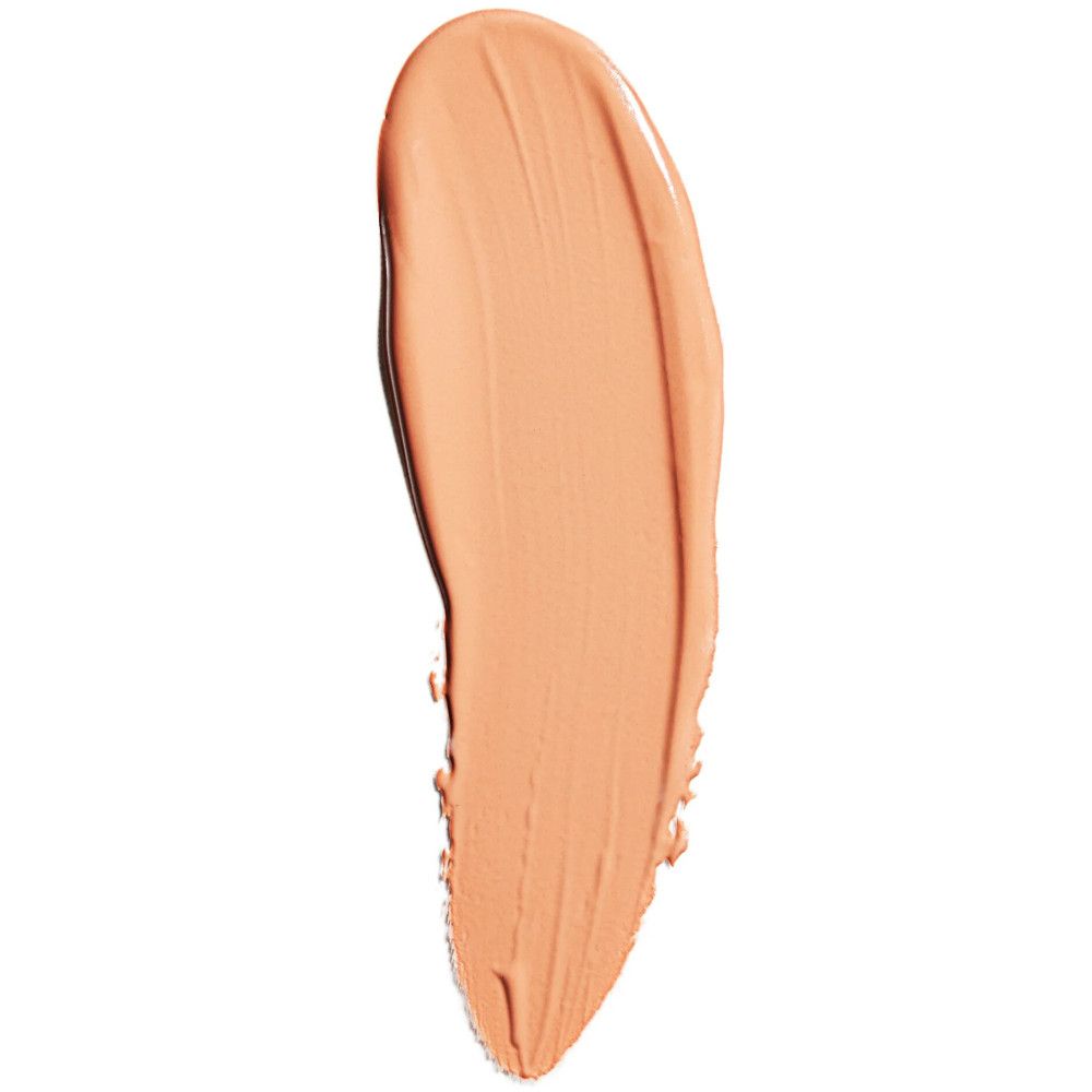 Un seul échantillon de rouge à lèvres crème dans un motif ovale vertical sur fond blanc.