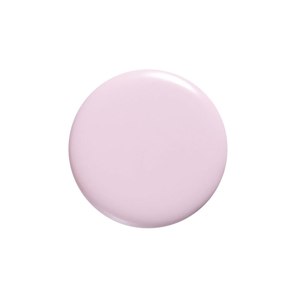 Een ronde druppel lichtroze nagellak.