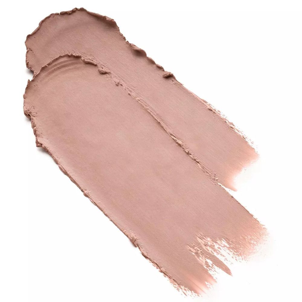 Deux traits de fixateur à sourcils dans une teinte rose clair sur fond blanc.