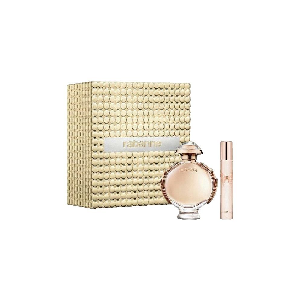 Cadeauset met parfumfles, verstuiver en verpakking. Gouden verpakking met logo. Roze fles en verstuiver.