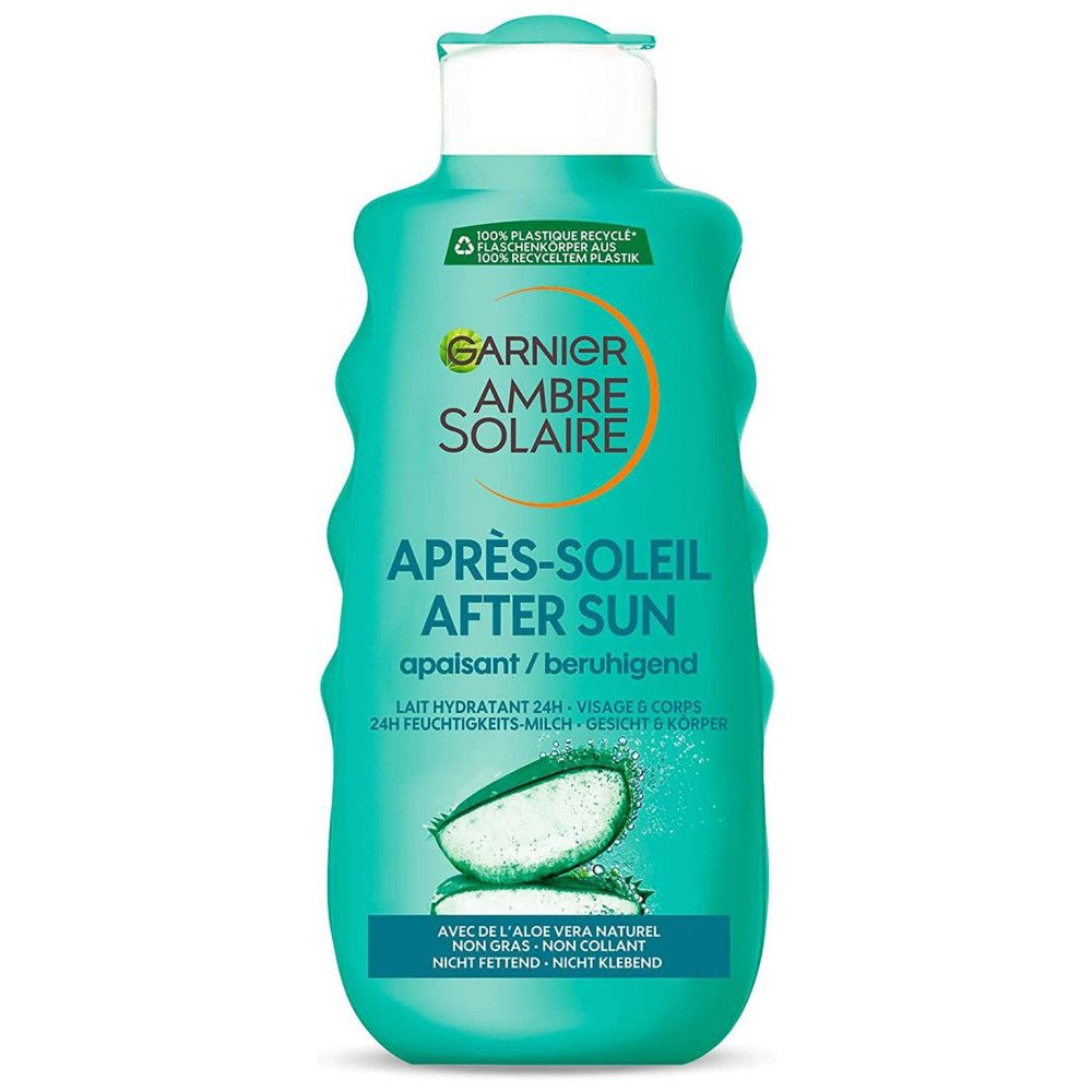 Groene fles Garnier Ambre Solaire Après-Soleil After Sun. Tekst: Aloë Vera, verzachtend, 24u hydratatie, gezicht & lichaam. Niet vet.