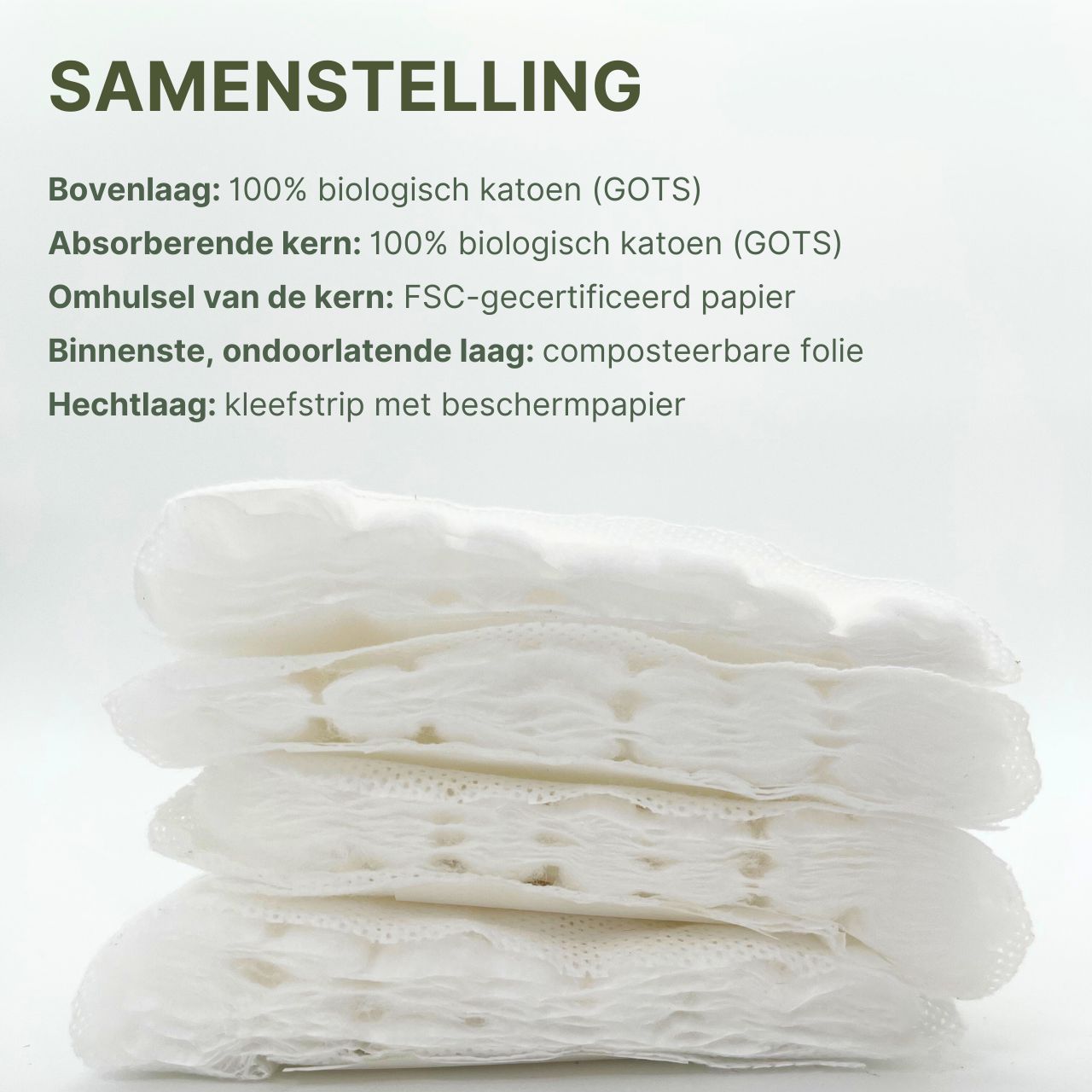 Stapel MyClarella® kraamverbanden. Samenstelling: 100% biologisch katoen, FSC-papier, composteerbare folie.