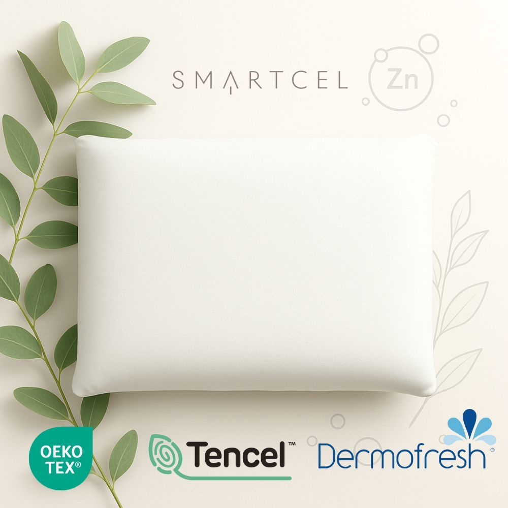 Wit kussen met tekst. Oeko-Tex, Tencel en Dermofresh logo's. Smartcel tekst.