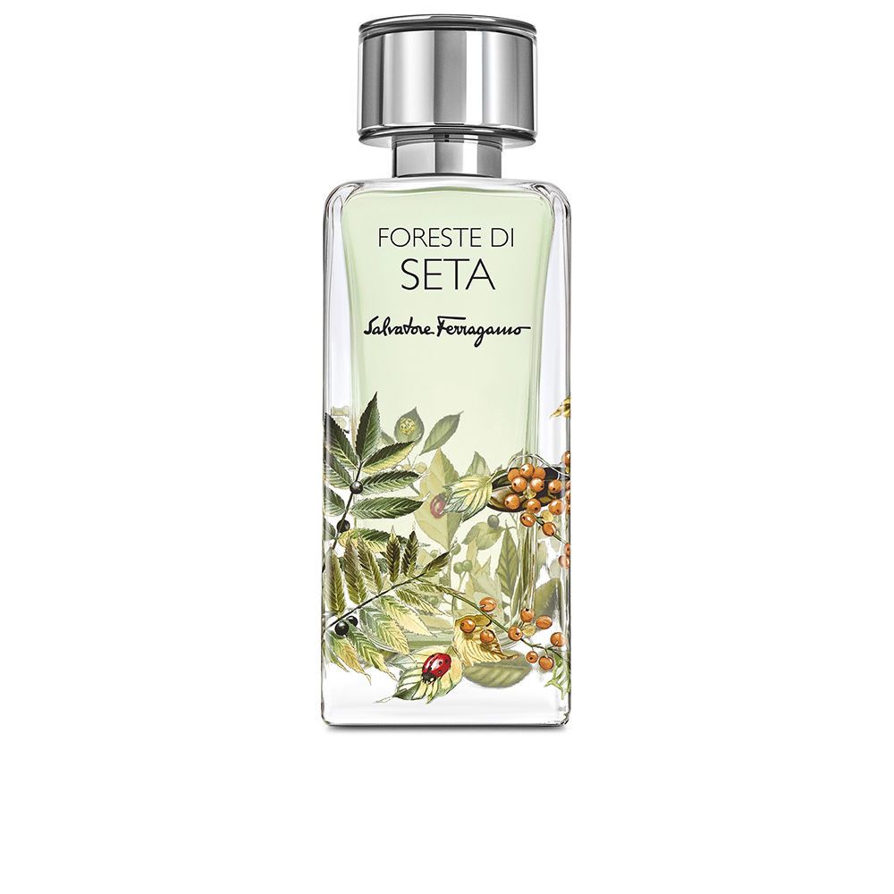 Flacon de parfum avec motif floral. Inscription : Foreste di Seta, Salvatore Ferragamo. Fond blanc.