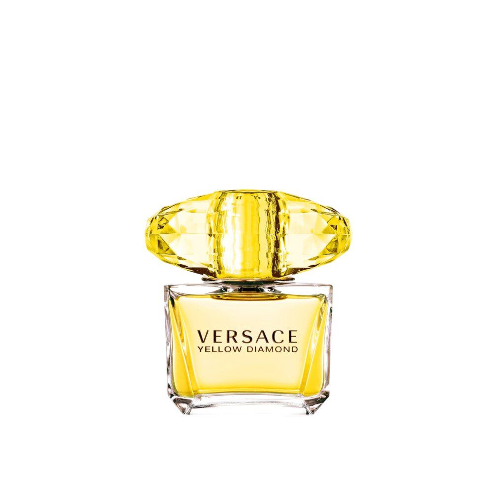 Flacon de parfum Versace Yellow Diamond jaune. Forme carrée avec bouchon diamant. Inscription Versace Yellow Diamond.