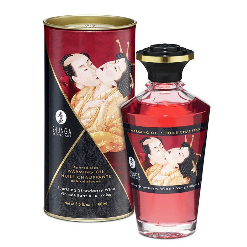 Flacon et boîte rouges avec étiquettes. Inscription : Shunga, Huile chauffante, arôme fraise. Illustration d'un couple s'embrassant.