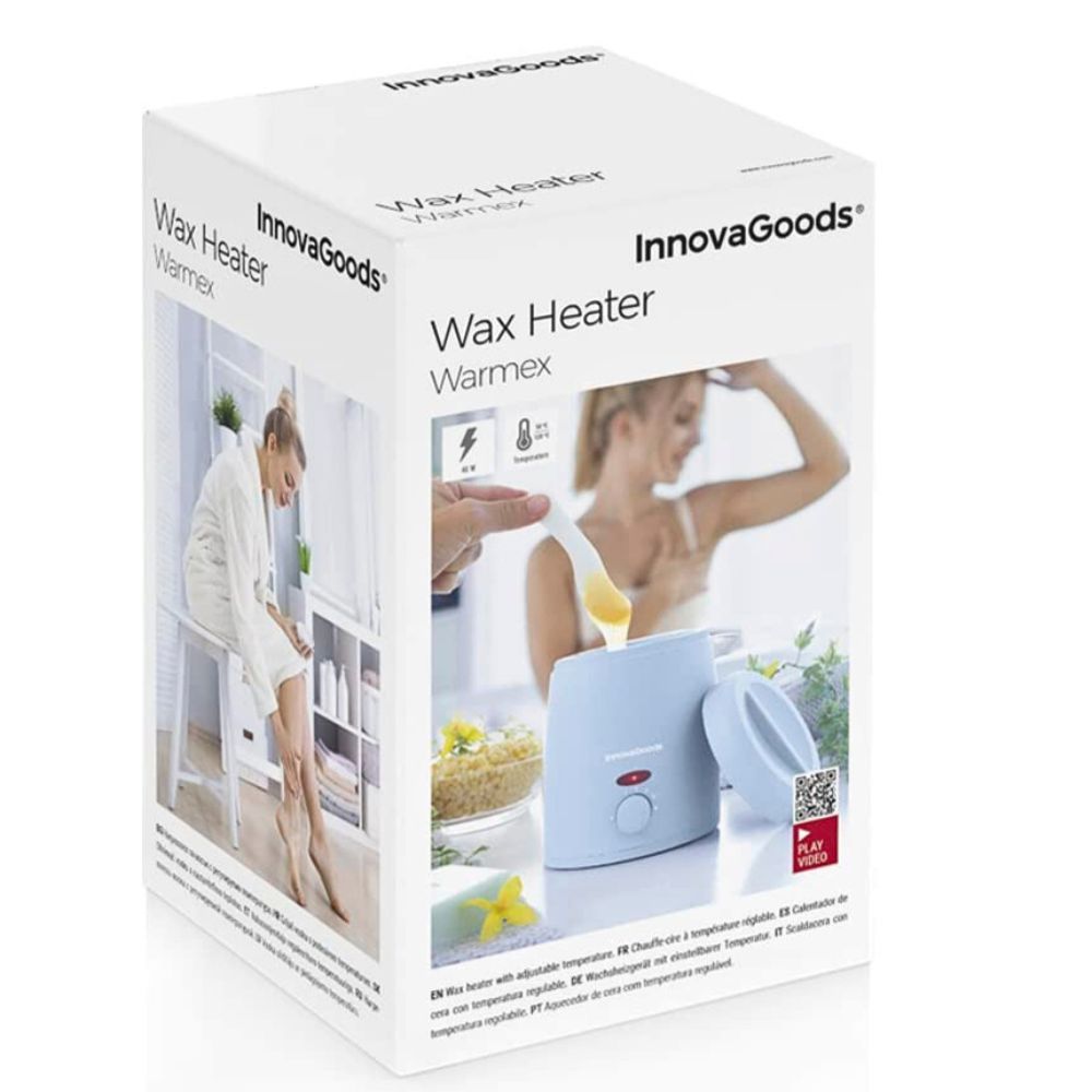 Emballage du chauffe-cire. Inscription: InnovaGoods, Wax Heater Warmex. Illustration d'une femme s'épilant.