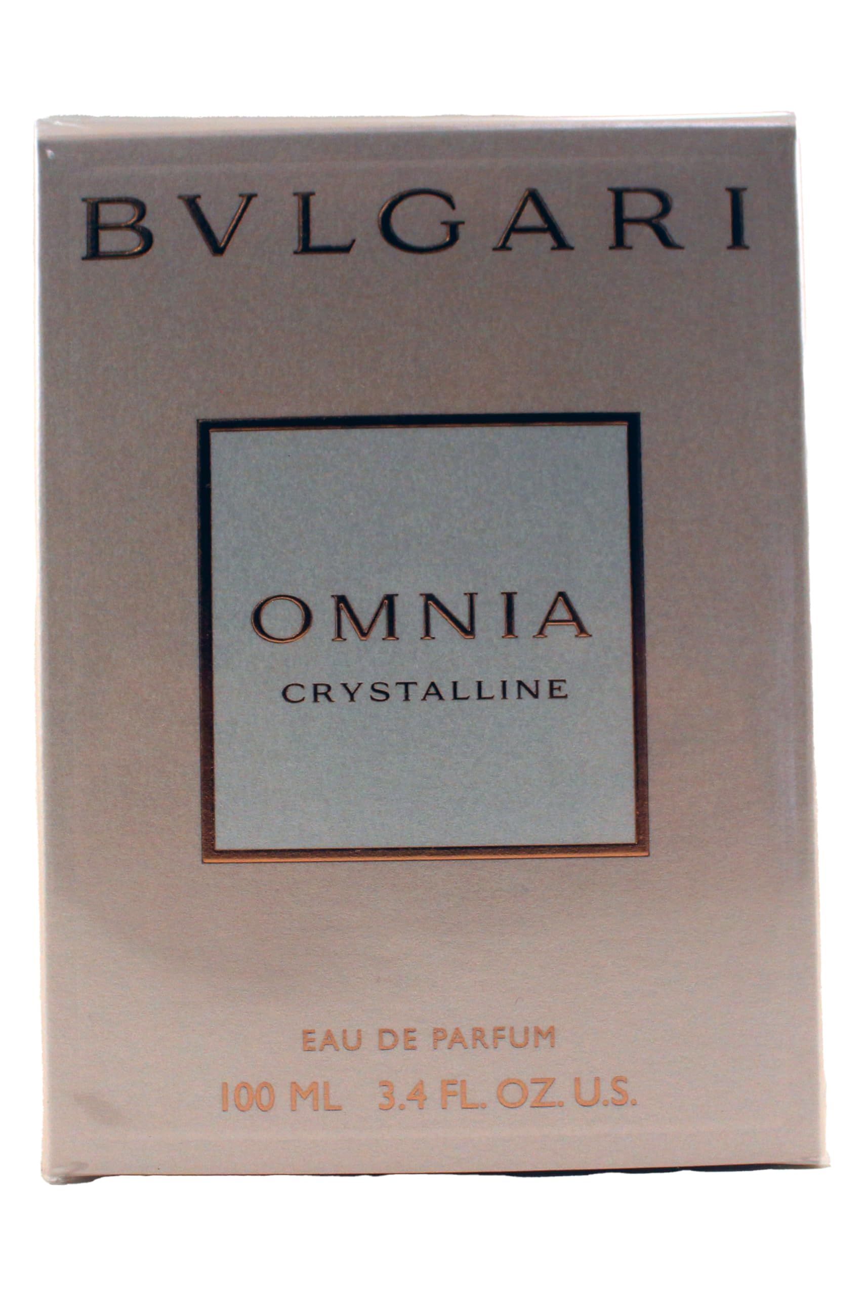 Beige kartonnen verpakking. Boven "BVLGARI". In het midden "OMNIA CRYSTALLINE". Onder "EAU DE PARFUM".