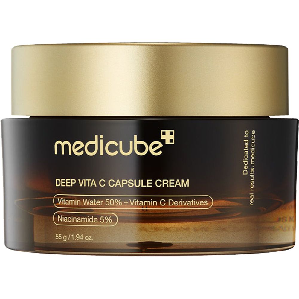 Bruine glazen pot met gele inhoud. Opschrift: medicube, Deep Vita C Capsule Cream, Vitamin Water 50% + Vitamin C Derivatives.