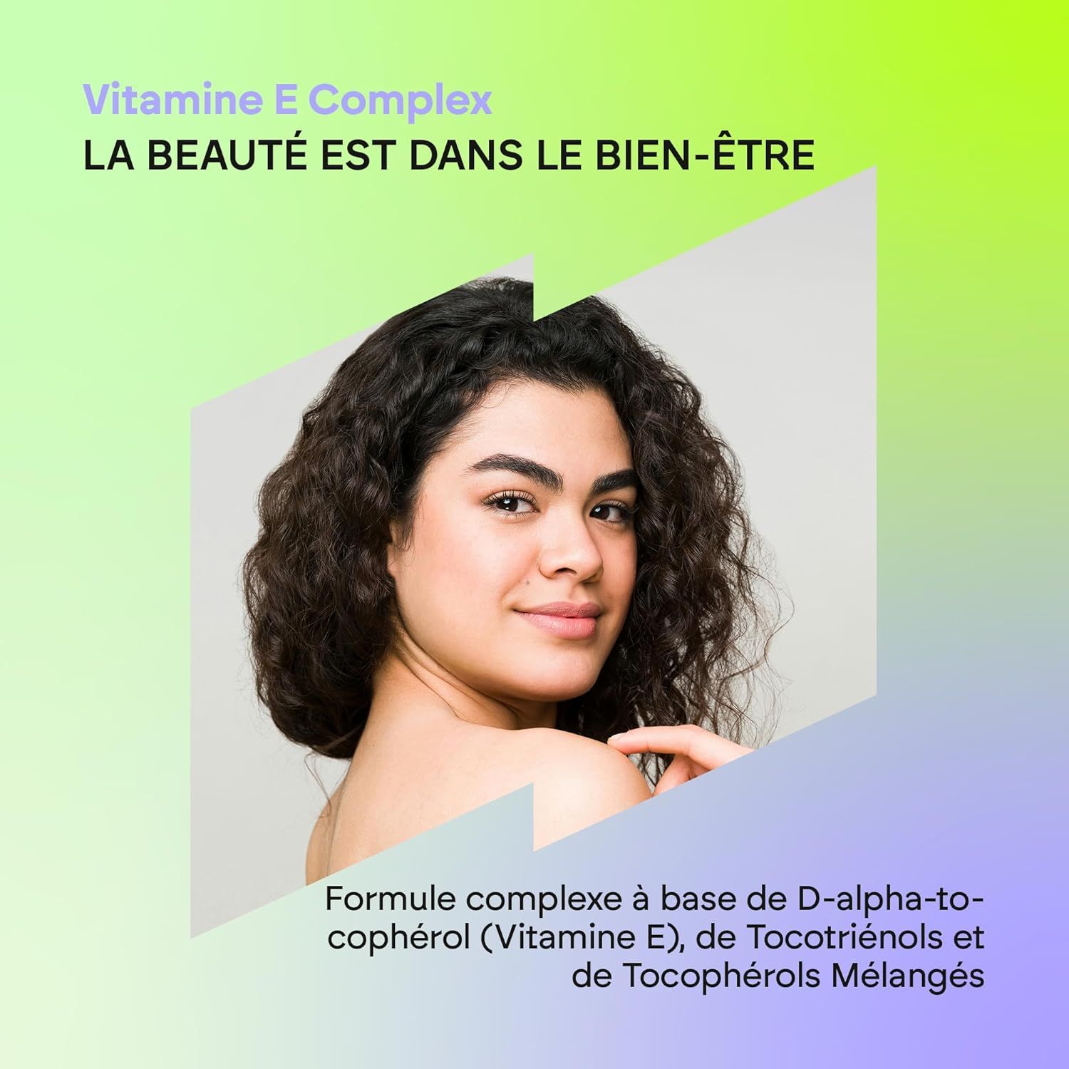 Femme souriante aux cheveux bruns et bouclés. Texte : Complexe Vitamine E. La beauté est dans le bien-être.