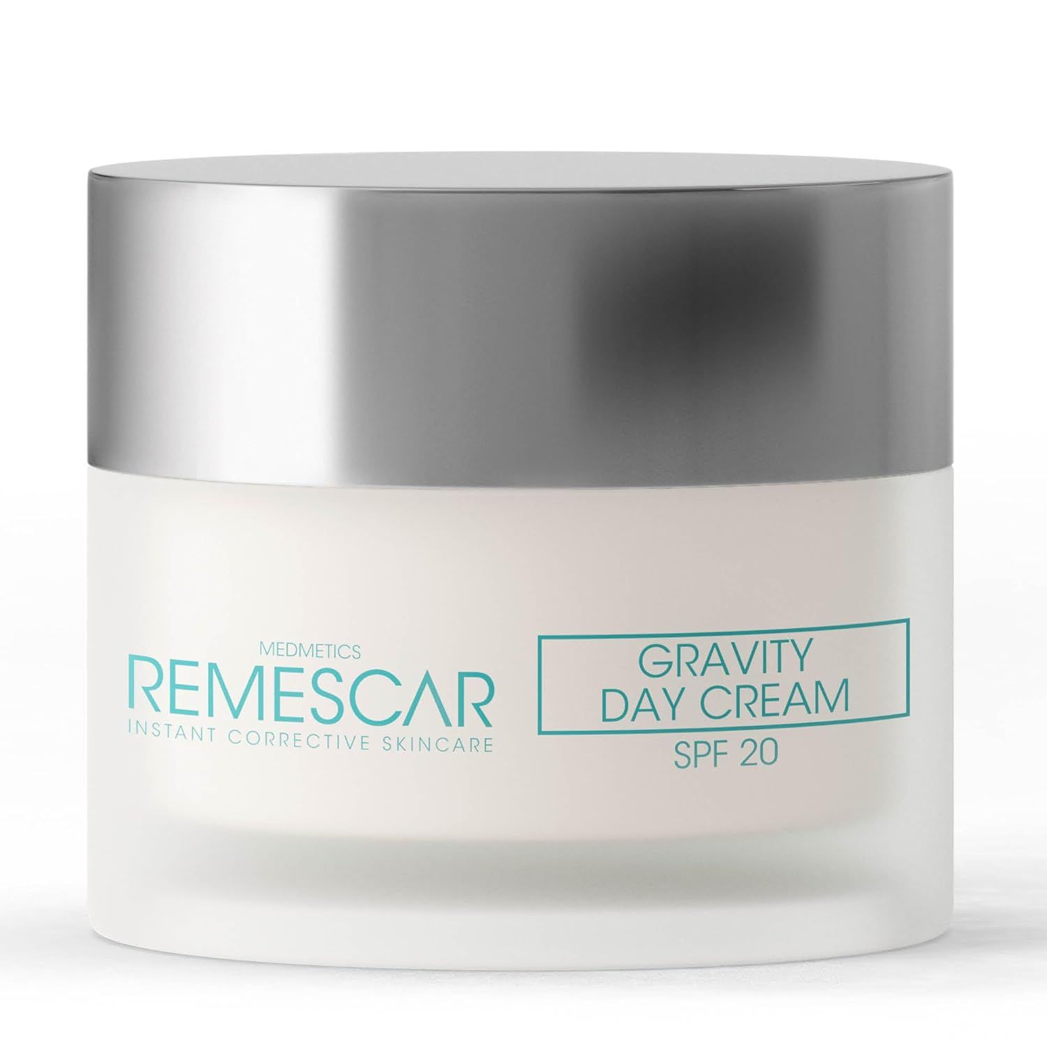 Pot de crème avec couvercle argenté. Inscription : Remescar, Gravity Day Cream SPF 20.