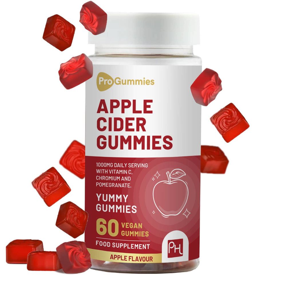 Bouteille blanche avec texte rouge. « Apple Cider Gummies » et « 60 vegan gummies » visibles. Bonbons rouges autour de la bouteille.