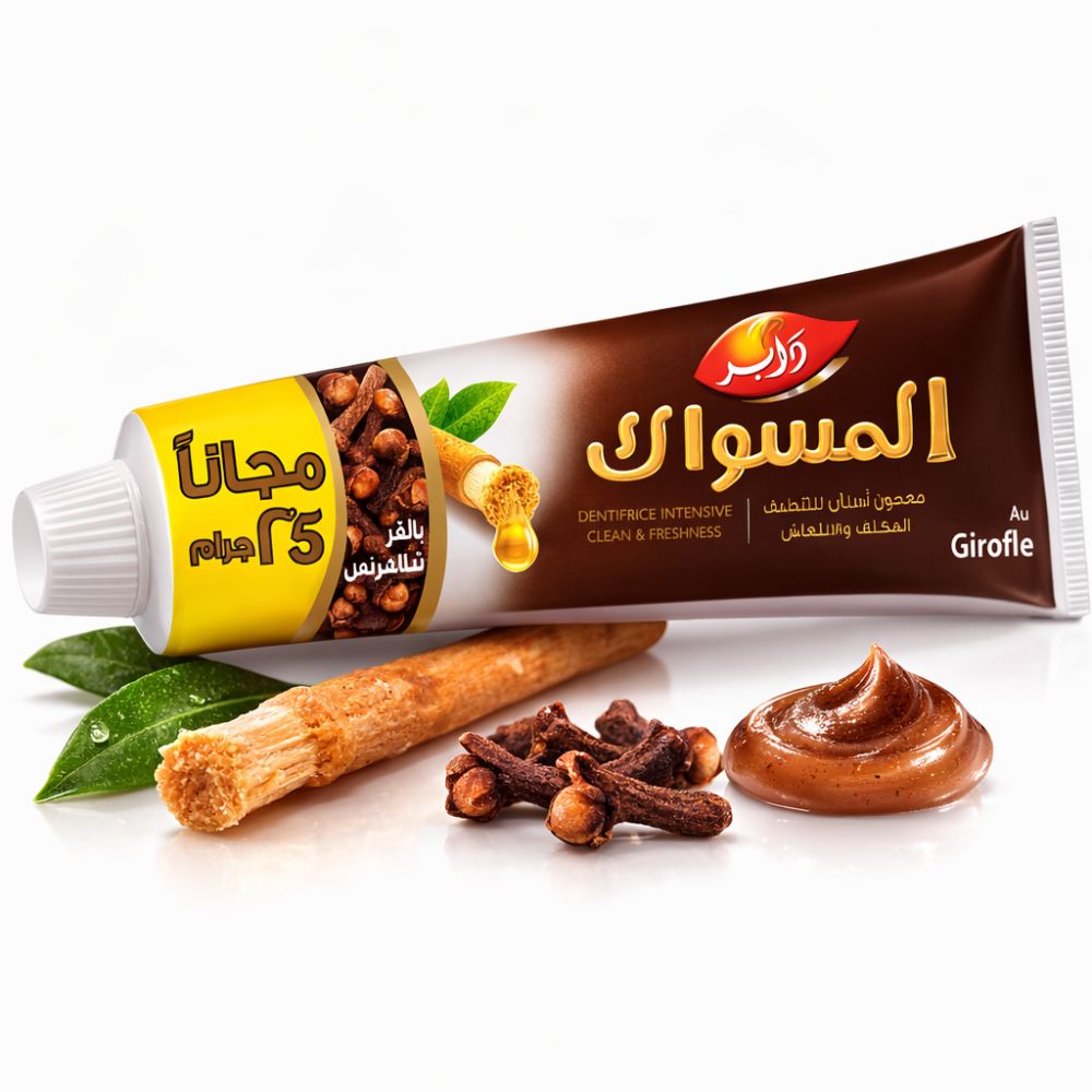 Bruine tandpastatube, miswak, kruidnagel en tandpastaklik. Arabische tekst. "Girofle"-logo.
