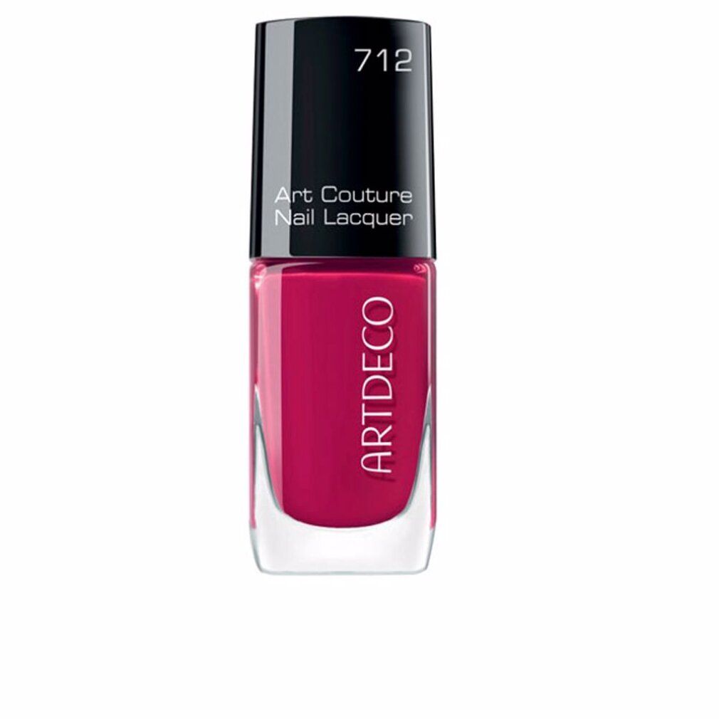 Nagellakfles met zwarte dop. Opschrift: Art Couture Nail Lacquer, ARTDECO. Kleur 712, roze.