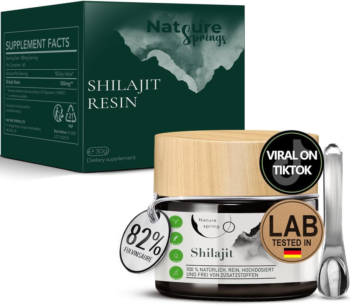 Pot de Shilajit avec couvercle en bois, à côté d'un emballage et d'un applicateur. Texte : 82% acide fulvique. Testé en laboratoire. Viral sur TikTok. Résine de Shilajit.