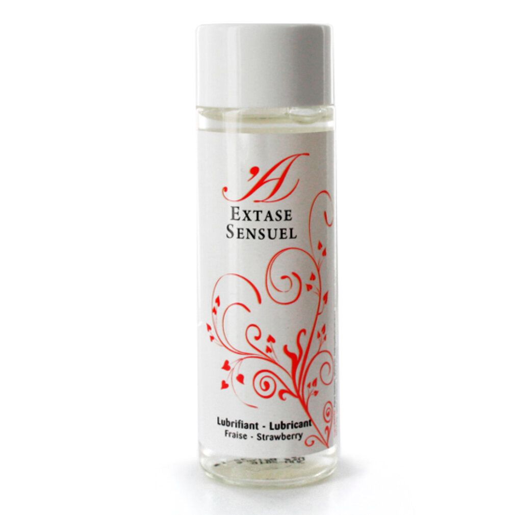 Flacon de lubrifiant saveur fraise, liquide clair, motif de cœur rouge sur l'étiquette.