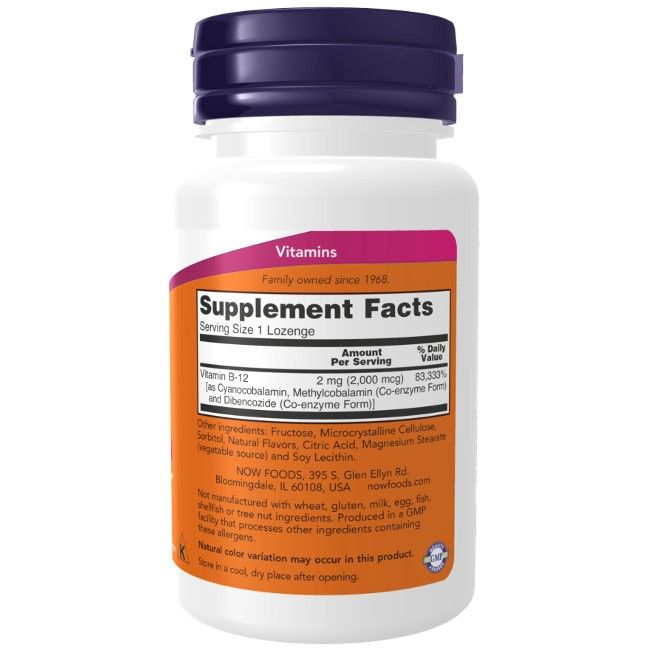Flacon blanc, bouchon violet. Étiquette "Supplement Facts" et informations nutritionnelles. Bande orange avec texte.