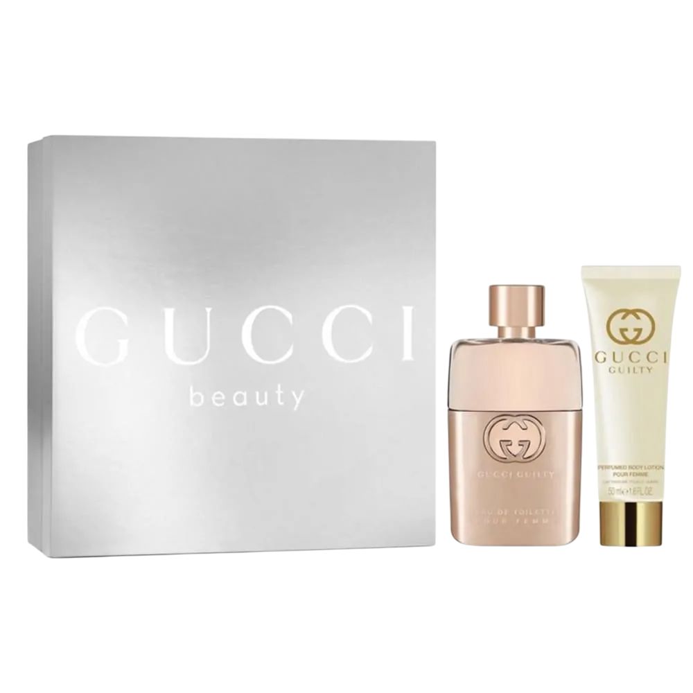 Geschenkset met parfumfles, bodylotion en doos. Gucci Beauty logo op de doos. Gucci Guilty logo op lotion.