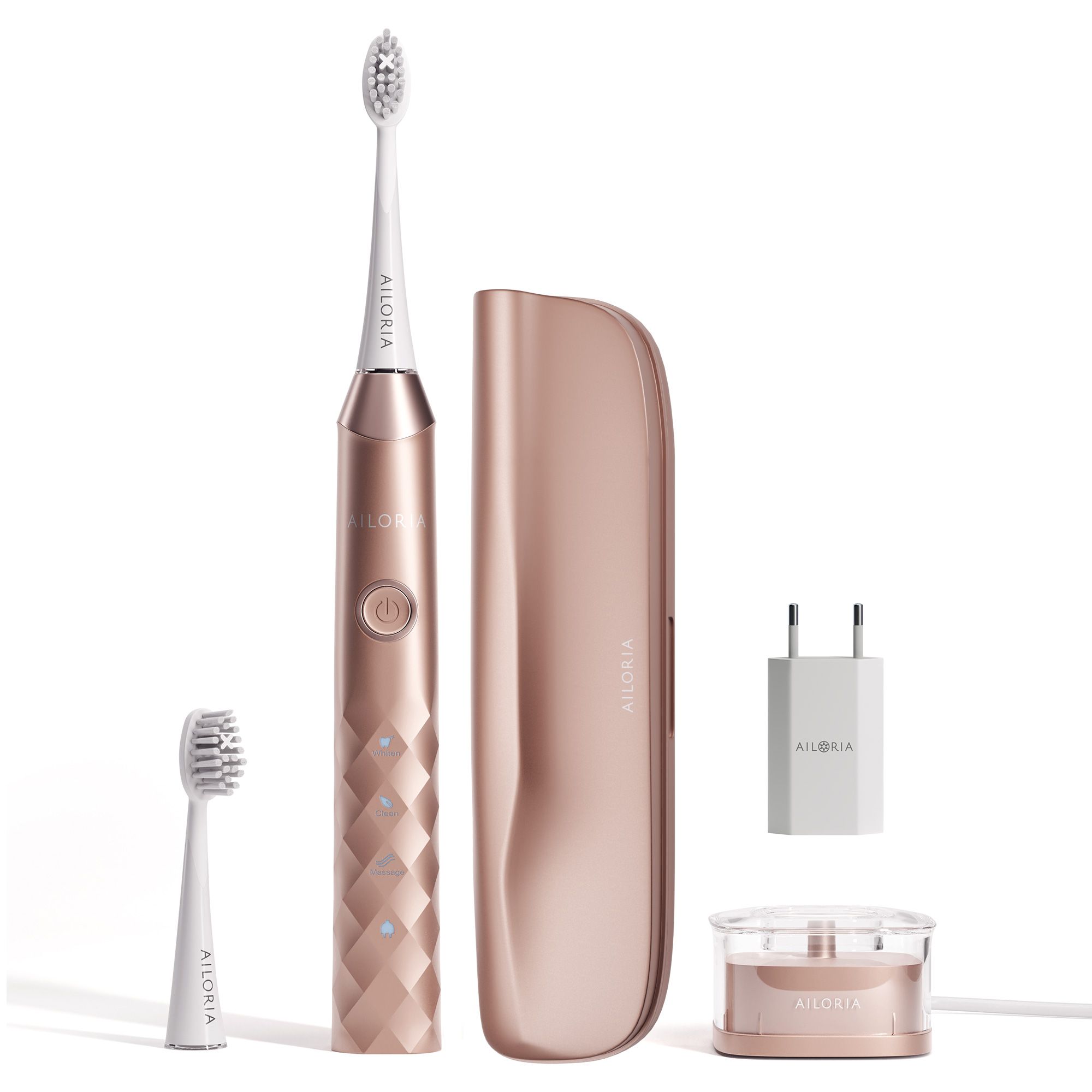 Brosse à dents, station de charge, étui de voyage, adaptateur secteur. Or rose. Logo AILORIA. Deux têtes.