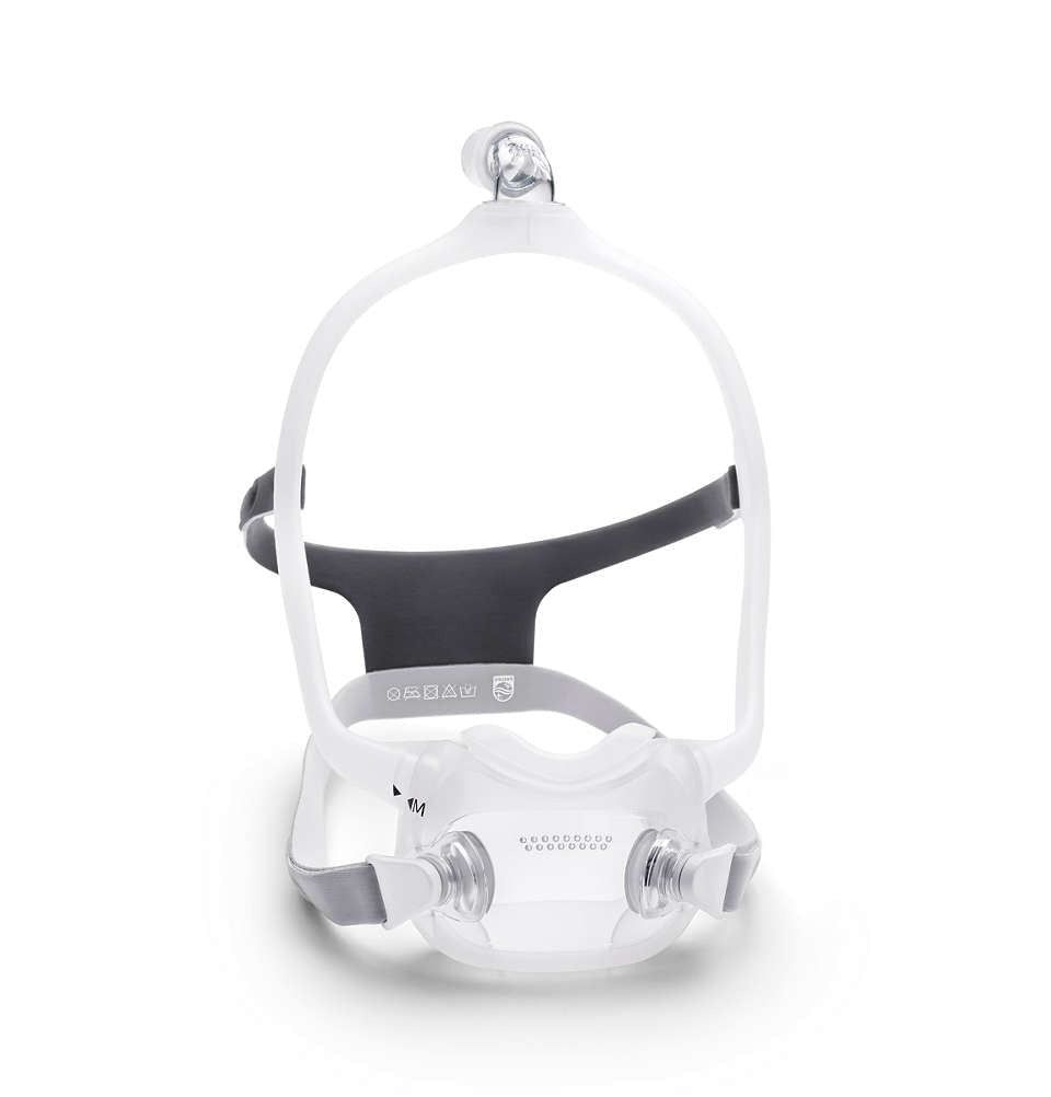 Masque nasal intégral Philips CPAP DreamWear blanc avec bandeau gris et connecteur de tube transparent.