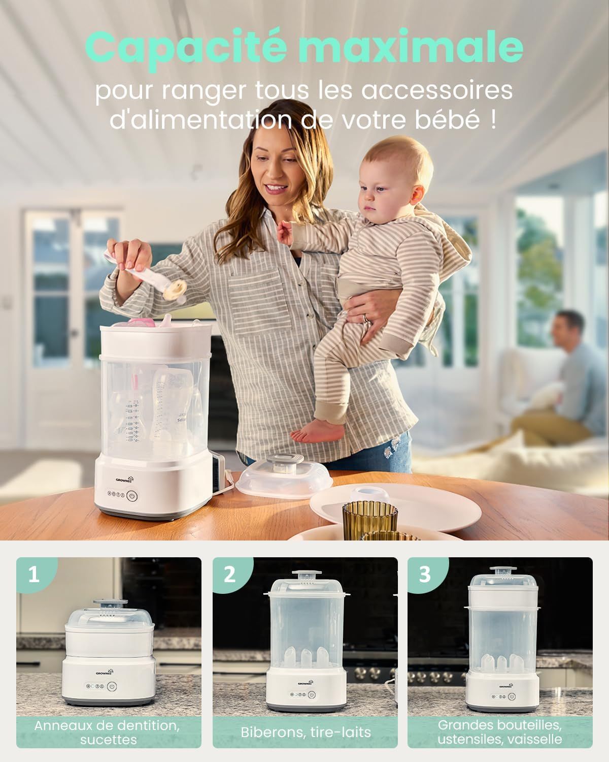 Stérilisateur blanc pour biberons avec récipient transparent contenant des biberons et accessoires. Une femme tient un bébé.